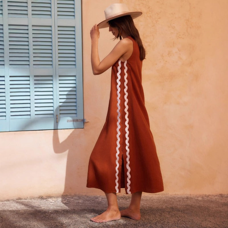 Women's sleeveless midi dress - spring/summer casual fashion: round neck, solid color, lace trim, and slit detail